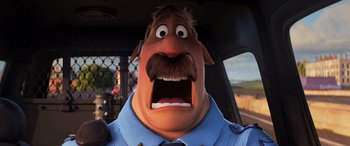 Movie still from “Onward” (2020), directed by Dan Scanlon – An image of a man with a mustache in a car; Close Up shot, Low angle