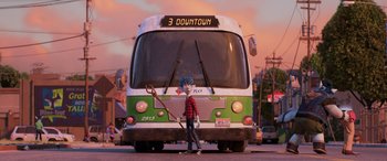 Movie still from “Onward” (2020), directed by Dan Scanlon – A cartoon character standing in front of a bus; Wide shot, High angle