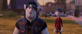 Movie still from “Onward” (2020), directed by Dan Scanlon – Two animated characters are standing in a grassy field; Medium shot, Over the shoulder angle