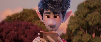 Movie still from “Onward” (2020), directed by Dan Scanlon – An image of an animated character holding a book; Close Up shot, Over the shoulder angle