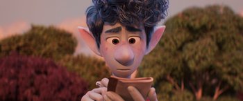 Movie still from “Onward” (2020), directed by Dan Scanlon – An image of an animated character holding a cup of coffee; Close Up shot, Over the shoulder angle