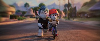 Movie still from “Onward” (2020), directed by Dan Scanlon – A boy riding a bike next to a boy running; Wide shot, Over the shoulder angle