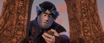 Movie still from “Onward” (2020), directed by Dan Scanlon – A person with a cookie in their hand; Close Up shot, Over the shoulder angle