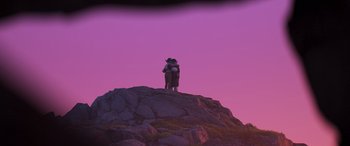 Movie still from “Onward” (2020), directed by Dan Scanlon – Two people standing on top of a rock at sunset; Extreme Wide shot, Low angle