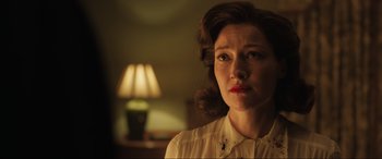 Movie still from “Operation Mincemeat” (2021), directed by John Madden – A person wearing a dress shirt; Close Up shot, Low angle