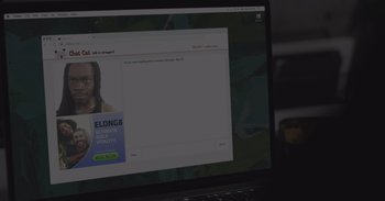 Movie still from “Outside” (2021), directed by Farahd Wallizada – A computer screen showing a call - to - engaged advertisement; Extreme Close Up shot, Over the shoulder angle