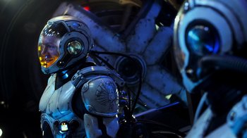 Movie still from “Pacific Rim” (2013), directed by Guillermo del Toro – A person wearing a helmet; Medium shot, Overhead angle