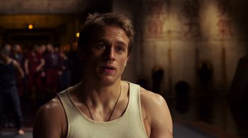 Movie still from “Pacific Rim” (2013), directed by Guillermo del Toro – A person wearing a tank top; Close Up shot, Over the shoulder angle
