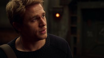 Movie still from “Pacific Rim” (2013), directed by Guillermo del Toro – A person wearing a sweater; Close Up shot, Over the shoulder angle