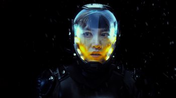 Movie still from “Pacific Rim” (2013), directed by Guillermo del Toro – A person wearing a space suit and a helmet; Close Up shot, Low angle
