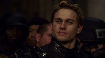 Movie still from “Pacific Rim” (2013), directed by Guillermo del Toro – A person wearing a leather jacket; Close Up shot, Over the shoulder angle