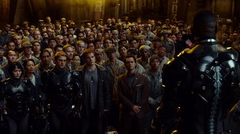 Movie still from “Pacific Rim” (2013), directed by Guillermo del Toro – A large group of men standing in front of each other; Wide shot, High angle