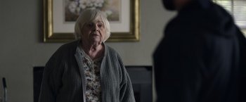 Movie still from “Palmer” (2021), directed by Fisher Stevens – An older woman standing in front of a mirror; Close Up shot, Over the shoulder angle