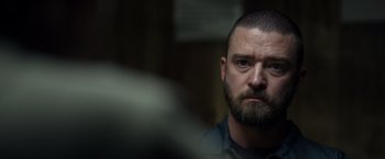 Movie still from “Palmer” (2021), directed by Fisher Stevens – A person with a beard; Close Up shot, Over the shoulder angle