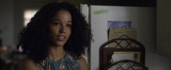 Movie still from “Palmer” (2021), directed by Fisher Stevens – A woman standing in front of an open refrigerator; Close Up shot, Over the shoulder angle