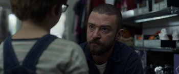 Movie still from “Palmer” (2021), directed by Fisher Stevens – A person talking to another person; Close Up shot, Over the shoulder angle