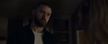 Movie still from “Palmer” (2021), directed by Fisher Stevens – A person with a beard; Close Up shot, Over the shoulder angle