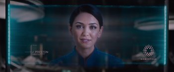 Movie still from “Passengers” (2016), directed by Morten Tyldum – A woman's face in front of a mirror; Close Up shot, Over the shoulder angle