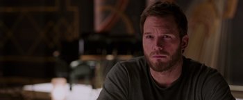 Movie still from “Passengers” (2016), directed by Morten Tyldum – A person with a beard; Close Up shot, Over the shoulder angle