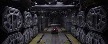 Movie still from “Passengers” (2016), directed by Morten Tyldum – An image of an airplane that is on the runway; Extreme Wide shot, High angle