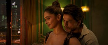 Movie still from “Pathaan” (2023), directed by Siddharth Anand – Deepika padukone and shah rukh khan in a scene from ' jab harry met sejal '; Close Up shot, Over the shoulder angle