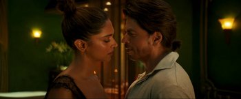 Movie still from “Pathaan” (2023), directed by Siddharth Anand – Deepika padukone and shah rukh khan in a scene from ' jab harry met sejal '; Close Up shot, Over the shoulder angle