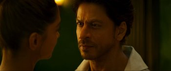 Movie still from “Pathaan” (2023), directed by Siddharth Anand – A person with his face close to a woman; Close Up shot, Over the shoulder angle