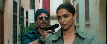 Movie still from “Pathaan” (2023), directed by Siddharth Anand – Deepika padukone and shah rukh khan in a scene from the movie; Close Up shot, Over the shoulder angle