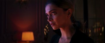 Movie still from “Pathaan” (2023), directed by Siddharth Anand – A person looking at the camera; Close Up shot, Over the shoulder angle