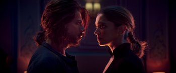 Movie still from “Pathaan” (2023), directed by Siddharth Anand – A man and a woman face to face in the dark; Close Up shot, Over the shoulder angle