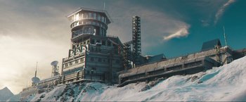 Movie still from “Pathaan” (2023), directed by Siddharth Anand – An abandoned building on top of a hill; Extreme Wide shot, High angle