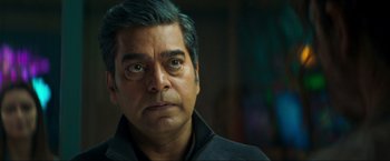 Movie still from “Pathaan” (2023), directed by Siddharth Anand – A person wearing a jacket; Close Up shot, Low angle