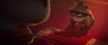 Movie still from “Paws of Fury: The Legend of Hank” (2022), directed by Chris Bailey – A cat wearing a hat is looking at a cat on the stairs; Close Up shot, Over the shoulder angle