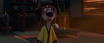 Movie still from “Paws of Fury: The Legend of Hank” (2022), directed by Chris Bailey – A cartoon dog wearing a yellow robe and standing in a room; Close Up shot, Over the shoulder angle