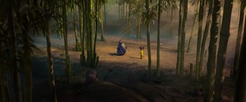 Movie still from “Paws of Fury: The Legend of Hank” (2022), directed by Chris Bailey – An image of a scene in the woods with a man and a child; Extreme Wide shot, High angle
