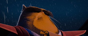 Movie still from “Paws of Fury: The Legend of Hank” (2022), directed by Chris Bailey – An illustration of a cat wearing a suit and tie; Extreme Close Up shot, Low angle