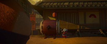 Movie still from “Paws of Fury: The Legend of Hank” (2022), directed by Chris Bailey – An animated scene of a cat and a drum; Wide shot, Low angle