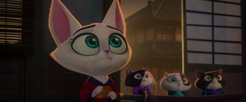 Movie still from “Paws of Fury: The Legend of Hank” (2022), directed by Chris Bailey – A group of cartoon characters sitting in front of a building; Close Up shot, Low angle