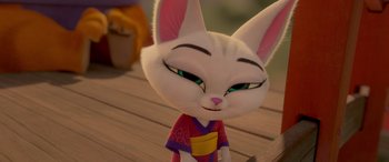 Movie still from “Paws of Fury: The Legend of Hank” (2022), directed by Chris Bailey – A cartoon cat is wearing a kimono and has green eyes; Extreme Close Up shot, High angle
