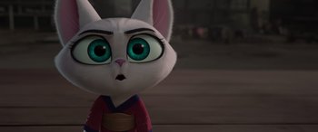 Movie still from “Paws of Fury: The Legend of Hank” (2022), directed by Chris Bailey – A cartoon cat with green eyes wearing a red outfit; Close Up shot, Low angle