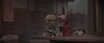 Movie still from “Paws of Fury: The Legend of Hank” (2022), directed by Chris Bailey – Two animated characters sitting next to each other on a table; Medium shot, Over the shoulder angle