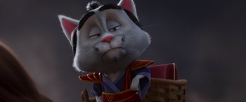 Movie still from “Paws of Fury: The Legend of Hank” (2022), directed by Chris Bailey – A cartoon cat with a black hair and a red shirt; Close Up shot, Low angle