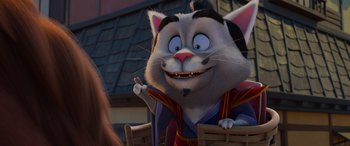 Movie still from “Paws of Fury: The Legend of Hank” (2022), directed by Chris Bailey – A cat character sitting in a chair in front of a building; Close Up shot, Over the shoulder angle