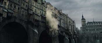 Movie still from “Perfume: The Story of a Murderer” (2006), directed by Tom Tykwer – A train is coming out of a tunnel; Extreme Wide shot, Low angle