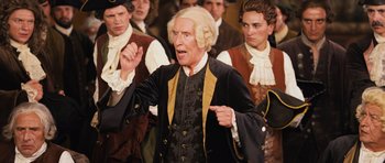 Movie still from “Perfume: The Story of a Murderer” (2006), directed by Tom Tykwer – An old man in a crowd of people; Medium shot, High angle