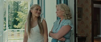 Movie still from “Pet Sematary: Bloodlines” (2023), directed by Lindsey Anderson Beer – Two women standing next to each other in front of a window; Close Up shot, Over the shoulder angle
