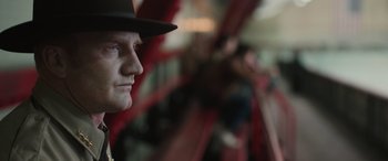 Movie still from “Pet Sematary: Bloodlines” (2023), directed by Lindsey Anderson Beer – A person wearing a hat; Close Up shot, Low angle