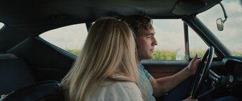 Movie still from “Pet Sematary: Bloodlines” (2023), directed by Lindsey Anderson Beer – A man and a woman sitting in the back of a car; Close Up shot, Over the shoulder angle