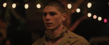 Movie still from “Pet Sematary: Bloodlines” (2023), directed by Lindsey Anderson Beer – A person wearing a neck scarf; Close Up shot, Low angle