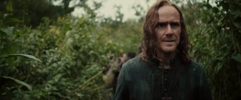 Movie still from “Pet Sematary: Bloodlines” (2023), directed by Lindsey Anderson Beer – A person with long brown hair; Close Up shot, Over the shoulder angle